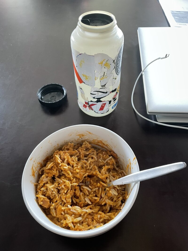 Chicken curry
mixed with rice, in a bowl with dingy old Nalgene bottle